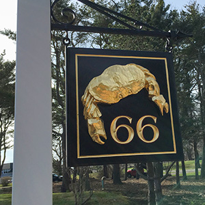 hand carved sign with 23k gold leaf and street number