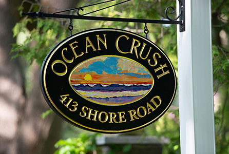 ocean crush 413 shore road carved gold leaf sign with hand painted sunrise